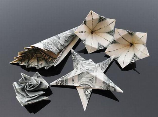 Ziedi jūraszvaigzne un kautkas Autors: Asiņainā Mērija Origami no naudas.