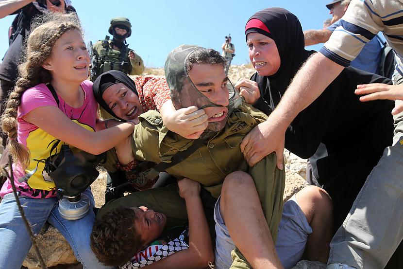 Palestīniescaroni cīnās par... Autors: kaķūns 26 spēcīgākie attēli pagājušajā nedēļā